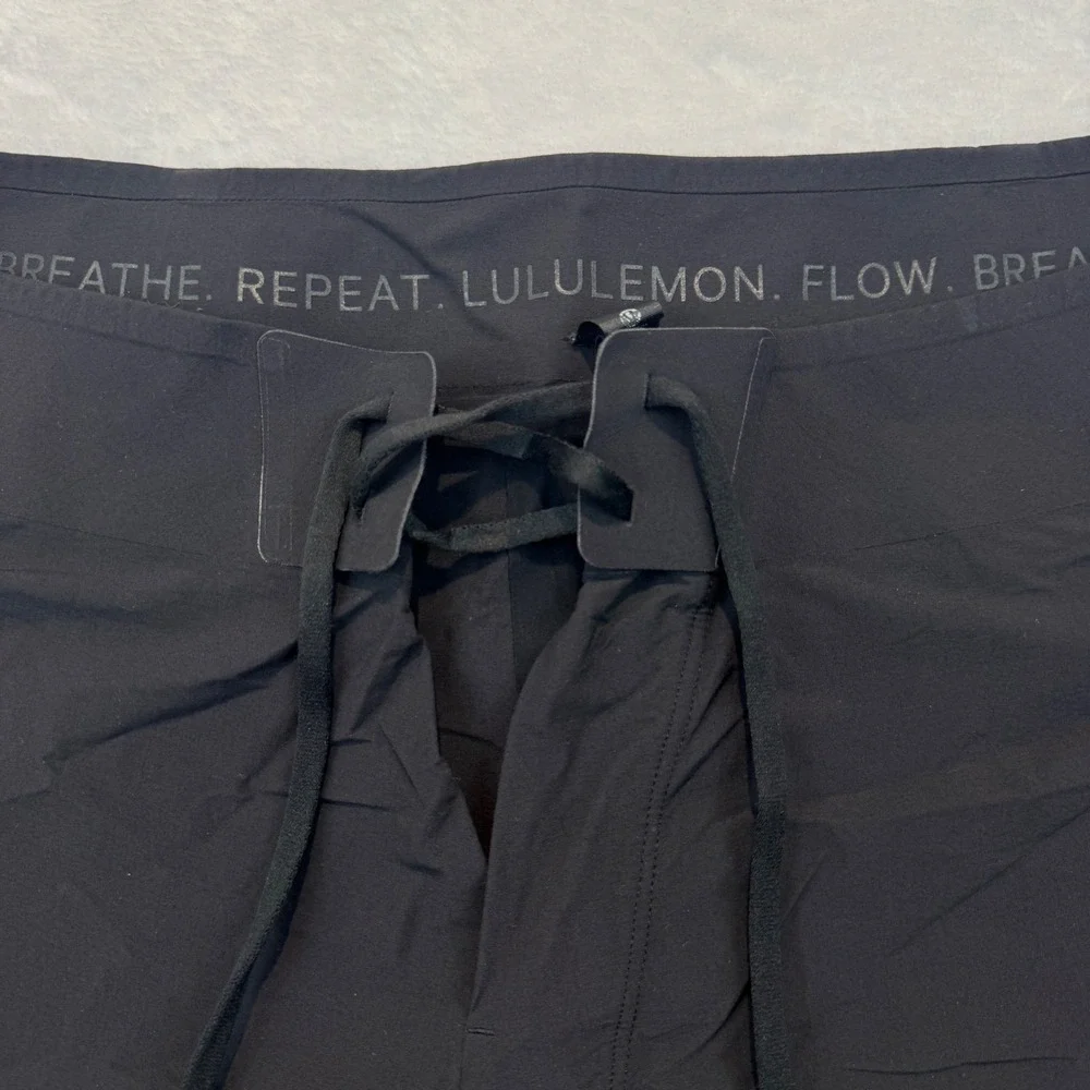Lululemon Mens Black Board Shorts Lace Up Swim Trunks Size 36 Zipper Pocket